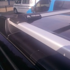 KIA Carnival (06-14) багажник на рейлинги Aguri Prestige Alu